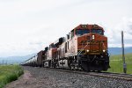 BNSF 7958 leads a tank train west a Birdseye Road